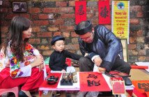 Old calligraphers with ink and red paper